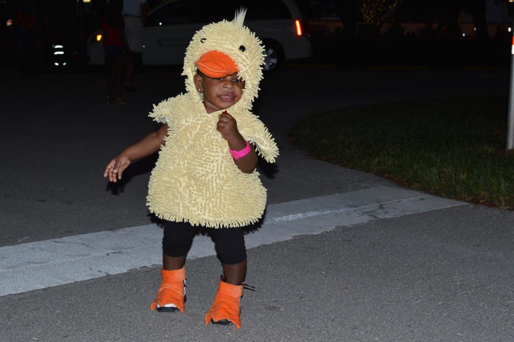 Young boy dressed as duckling